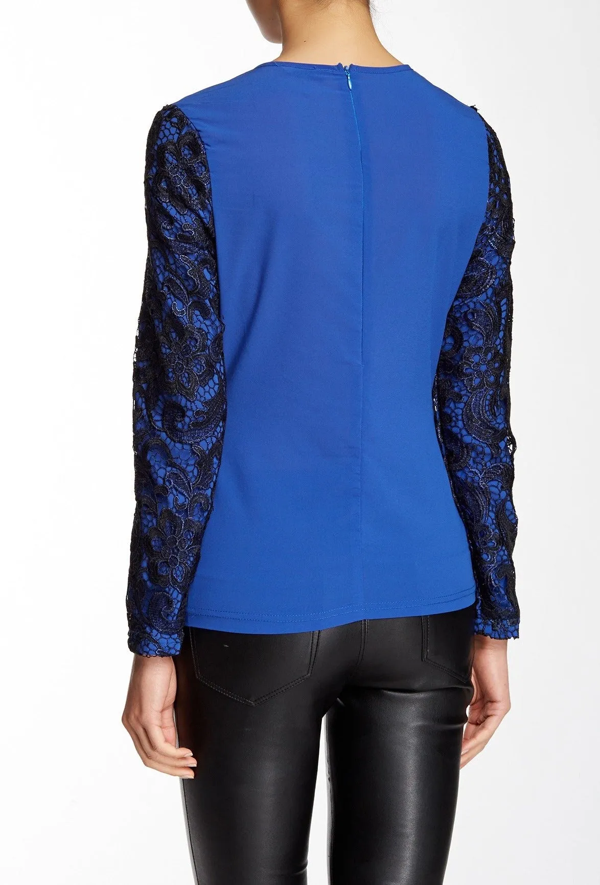 Lace and mesh add timeless character to this long sleeve blouse