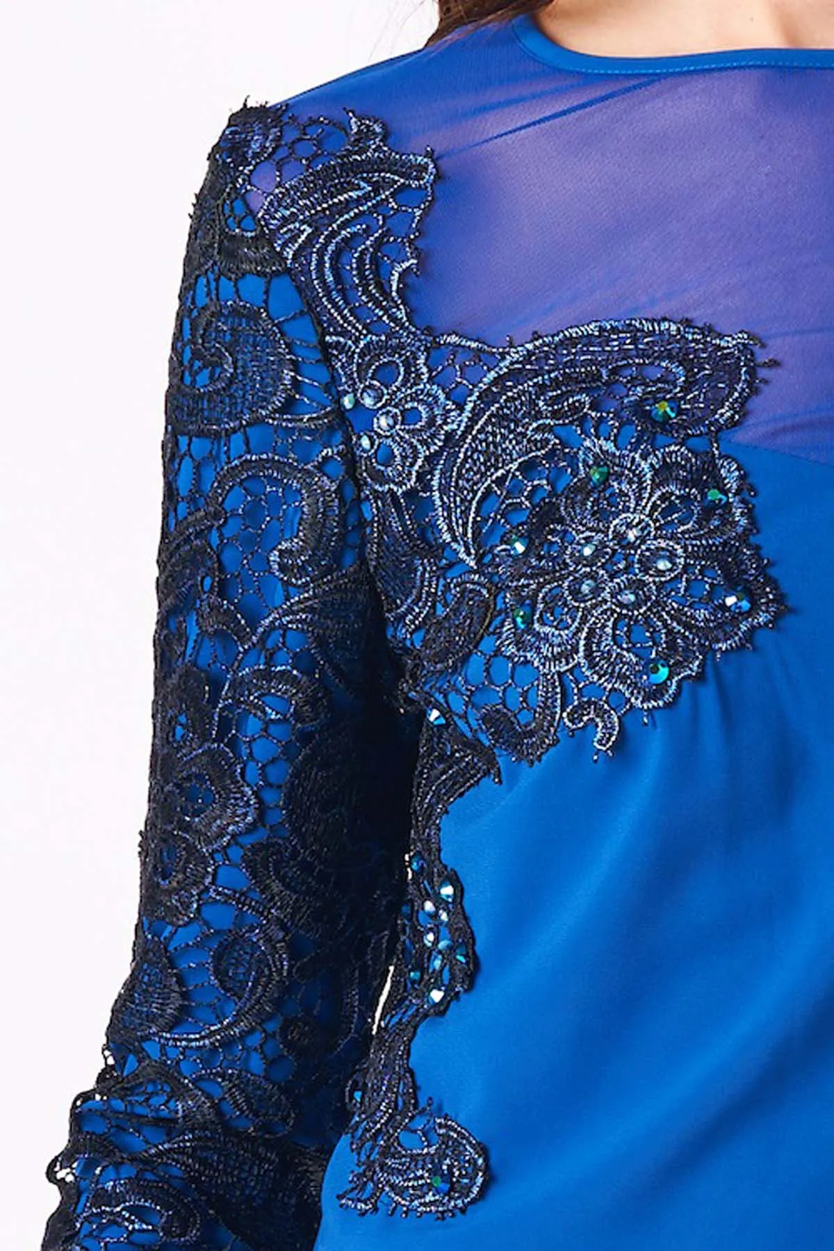 Lace and mesh add timeless character to this long sleeve blouse